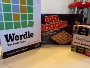 Picture of three games: Bib Boggle, Trivial Pursuit Mini Packs, and Wordle Party Game
